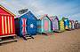 Photograph the colourful beach huts at Brighton Beach